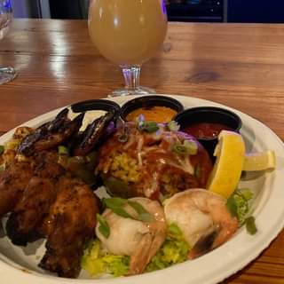 Combo special at LBC 2 chicken wings, 2 shrimp cocktail, 2 Cajun Shrimp and prim